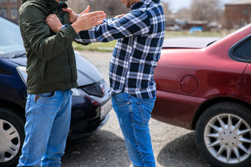 fighting men with car accident