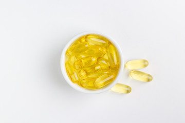 fish oil capsules isolated on white background
