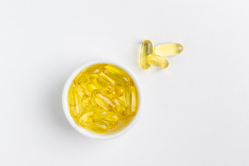 fish oil pills isolated on white background