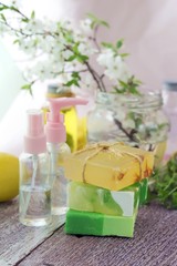 Soap, antiseptic liquid, plants, aromatic oil for hygienic procedures on the table, body care, spa, natural cosmetics, healthy lifestyle