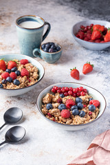 Tasty Strawberry Dessert, Homemade Yogurt with Strawberries, Granola and blueberries, raspberries and red currants. Seeds, Healthy Breakfast, Parfait in a Jar over Bright Background