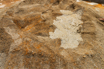 Mixture of cement and water.