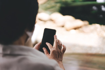 Asian elderly woman panic news about close city and department store prevent corona virus.