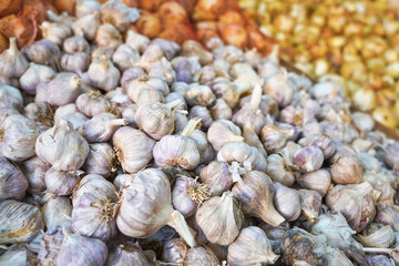 Garlic bulbs on display at street food market in Aqaba, Jordan