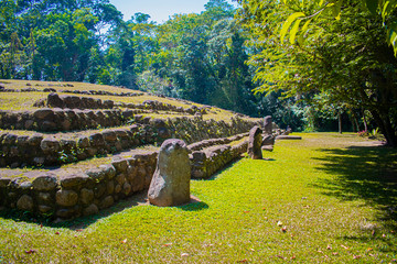 natural forest landscape, and with the Mayan temples and ruins of takalik abaj, with green plantains and stones