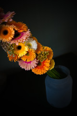 Fototapeta premium flowerdesign with gerbera flowers in shades of orange, yellow and pink 