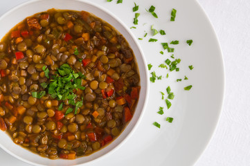 red lentil stew decorated with parsley