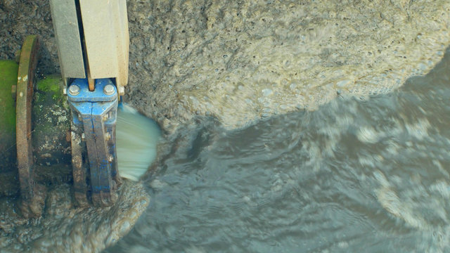 Biological purification of water sewage treatment plant waste water bubbles tank, activated sludge industrial wastewaters process using aeration biology floc composed protozoa bacteria, pollution