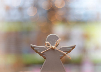 angel with bokeh background