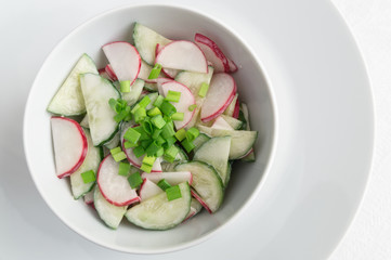 cucumber, radish, and green onion salad dressed with mayo