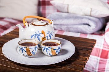 Fototapeta na wymiar two cup of tea on wooden table