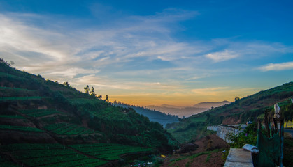 Fototapeta na wymiar Morning Sunlight lakes and mountains view from Ooty 
