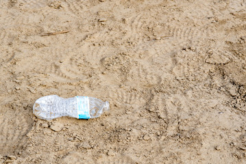 Fototapeta na wymiar bottle on the beach