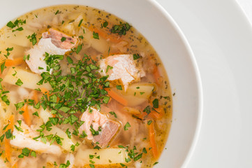 soup of salmon, pearl barley, potato, carrot, and onion with added herbs and spices. 
