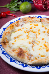 Whole round flatbread with cheese