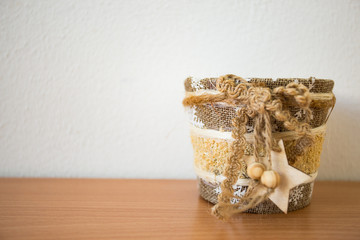 Small empty pot on a wooden table