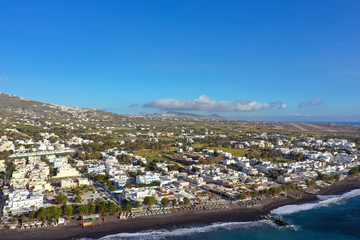 Fototapeta premium Aerial view of Kamari beach on Santorini island