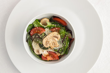 chard, rucula, and spinach salad with tomato, parmesan, and champignon