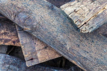 Old wooden boards after the collapsed house