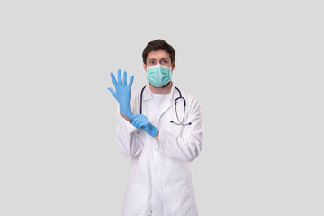 Doctor Puts on Gloves and Wearing Medical Mask. Medical Concept Corona Virus