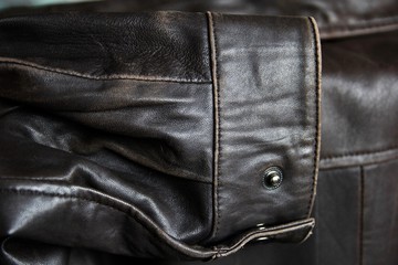 A fragment of a jacket made of genuine leather.