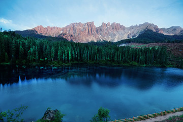 Dolomites mountains on Carezza lake in Alto Adige