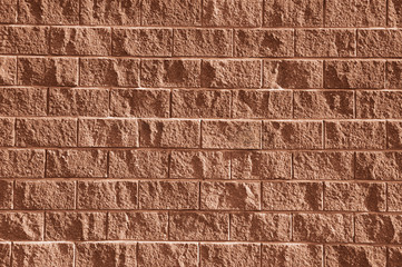 Old red stone wall background texture
