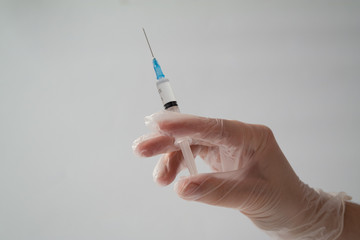 The concept of inoculation, vaccination or treatment of the disease. Close-up of the doctor's...