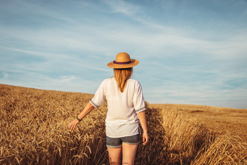 Woman farmer standing in field