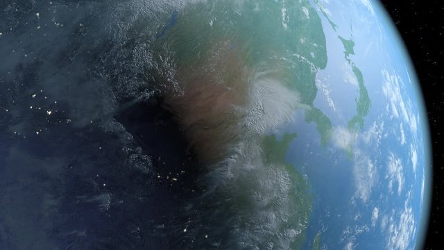 Spinning earth on China,Korea and Japan. Day turns to night.
