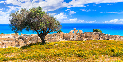 Ancient temples and turquoise sea -main touristic attractions of Cyprus island. columns of Kourion...