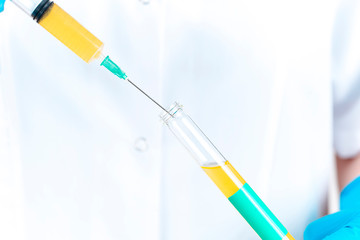 Young female doctor doing a blood test in a laboratory. drug and medical vaccine finding studies....