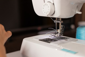 Sewing machine worked by a seamstress