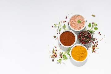 Spices, herbs and Himalaya salt on white background with copy space for your text. Template culinary blog social media.