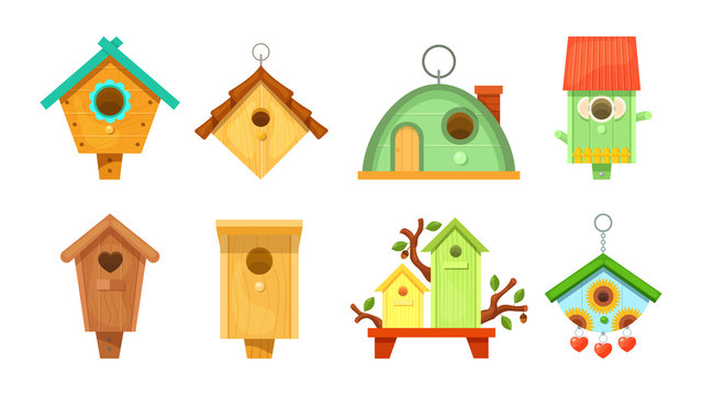 Decorative wooden spring bird houses. Colorful garden birdhouses for feeding birds. Wooden constructions to birds small buildings of planks with hole. Birdhouses set vector illustration.