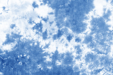 tie dye pattern hand dyed on cotton fabric abstract texture background.