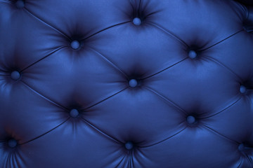 Naklejka premium luxury blue leather sofa background texture close up
