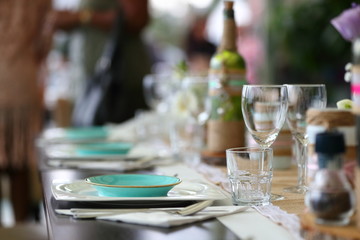 beautiful wine glasses on a set dinner table