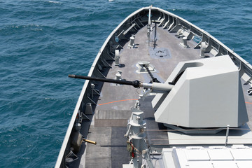 High technology modern naval main gun mounted on the stealth frigate warship use for naval warfare,...
