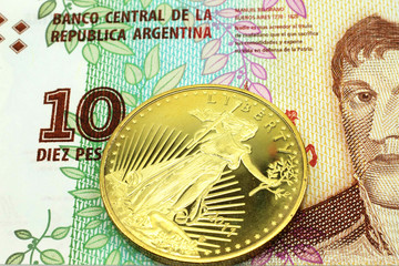 A macro image of a ten peso banknote from Argentina with a gold coin.  Shot close up.