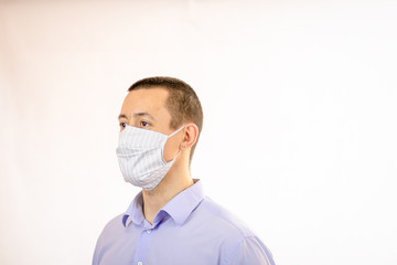 Man wearing protective mask to prevent getting sick. Medical and healthcare of Coronavirus COVID-19 concept. Copy space.