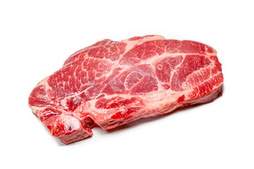 Raw pork neck tenderloin steak lies on a white background. Isolated