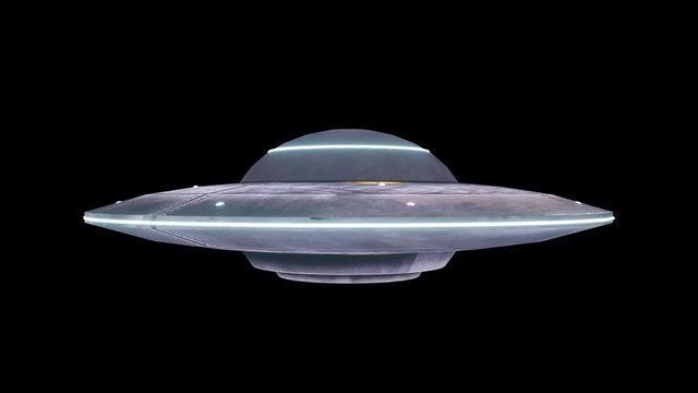 Flying saucer isolate on black screen. UFO. Alpha channel included. 4K animation
