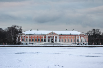 Manor Palace in Kuskovo in winter, Moscow, Russia, view across the pond. Travel around Russia in winter season.