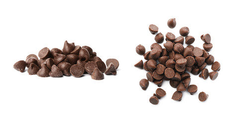 Piles of delicious chocolate chips on white background