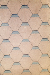 Tile flexible brown hexagonal shape. Construction, background, textures, design.