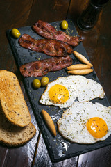 Breakfast with roasted bacon and roasted eggs