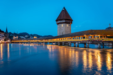 Famous Chapel Bridge, the city's symbol and one of the Switzerland's main tourist attractions, Switzerland. Historic city center of Lucerne