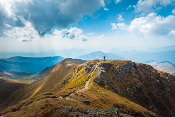 Hiking trough epic mountain landscape, exploring and feeling the freedom of nature