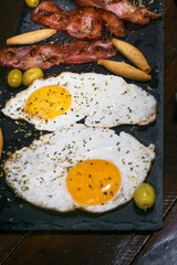 Breakfast with roasted bacon and roasted eggs